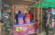 Sambangi Pasar, Satgas Yutisi Hanau Ingatkan Warga Terapkan Prokes
