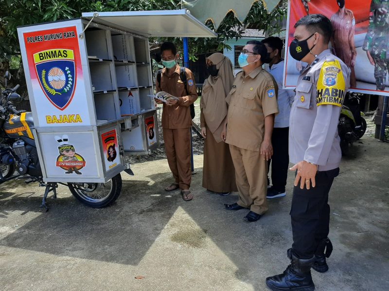 Personel Polsek Murung Pantau Vaksinasi Massal di Cristian Center