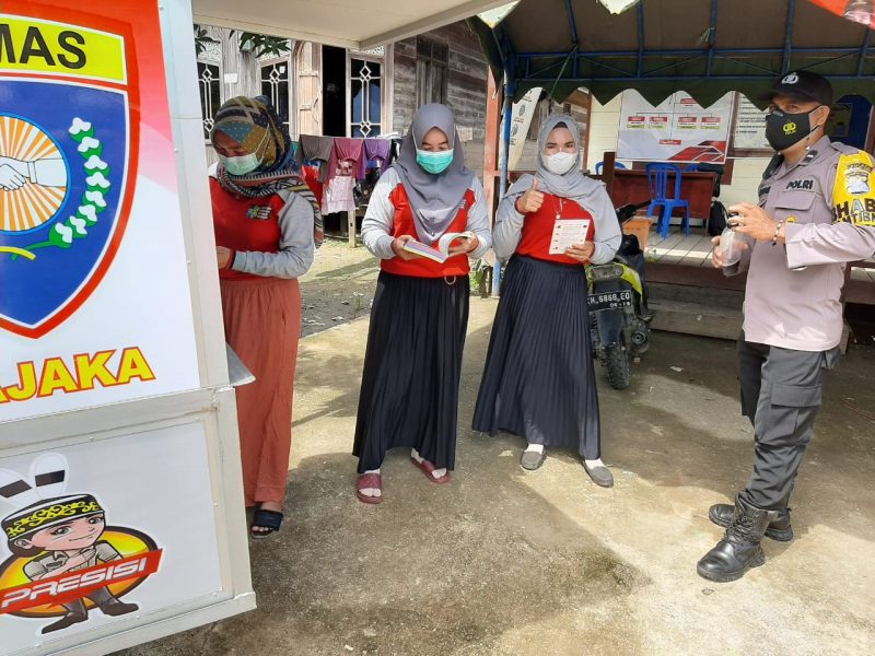 Bripka Abdul Haris Sambangi Warga dan Imbau Prokes